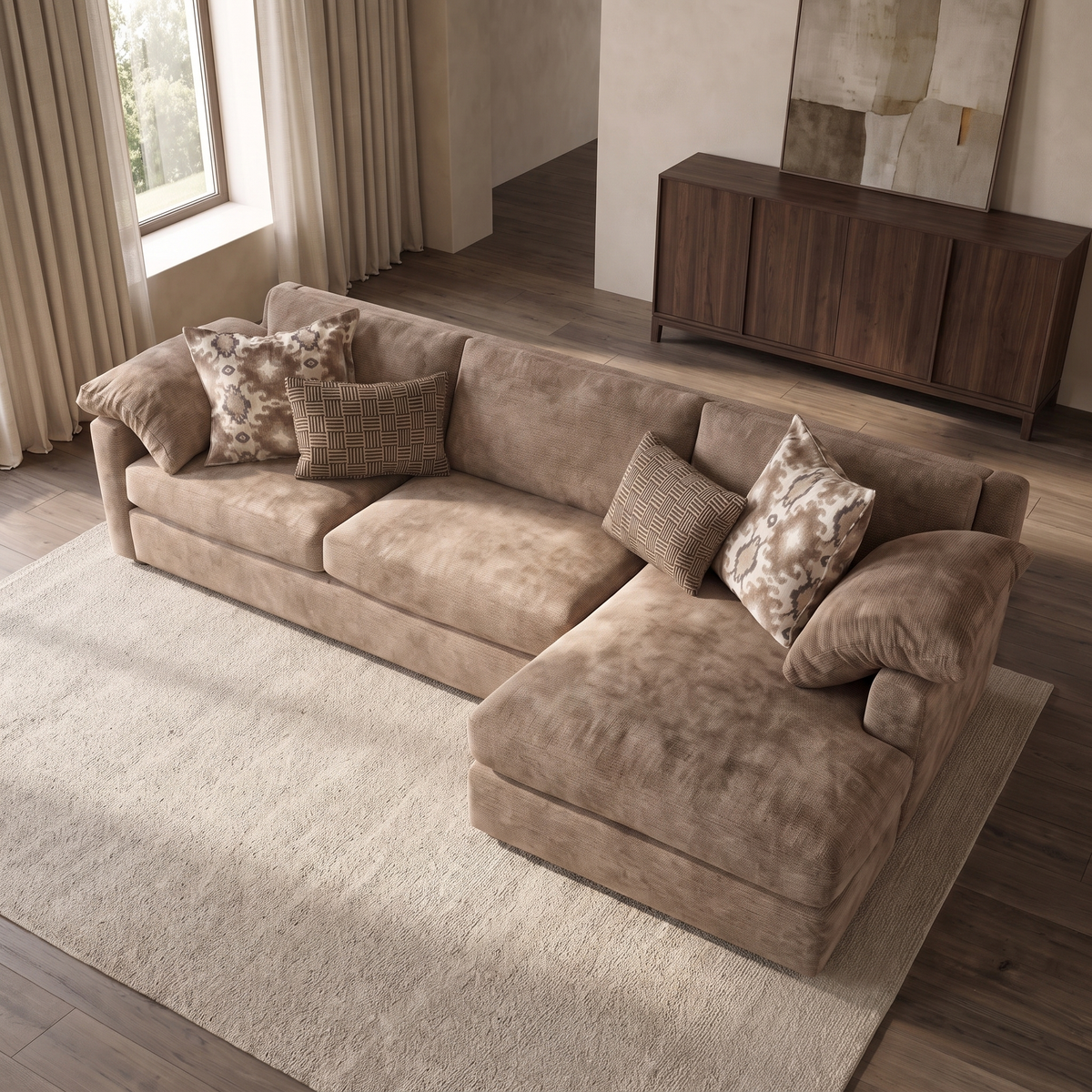 Ashbourne Grande Right Hand Facing Chaise Sofa — elevated camera view in a warm stone and walnut living room