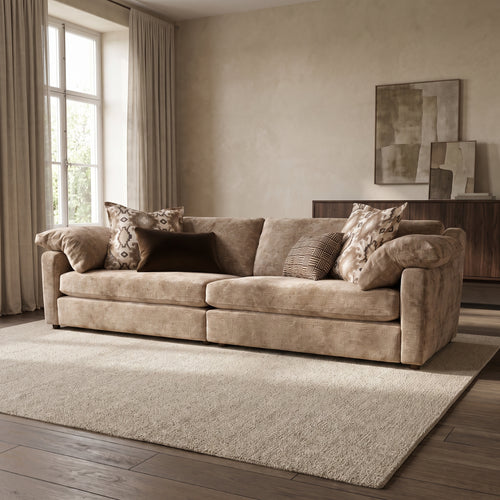 Ashbourne Grande Split Sofa — main lifestyle view in a warm stone and walnut living room
