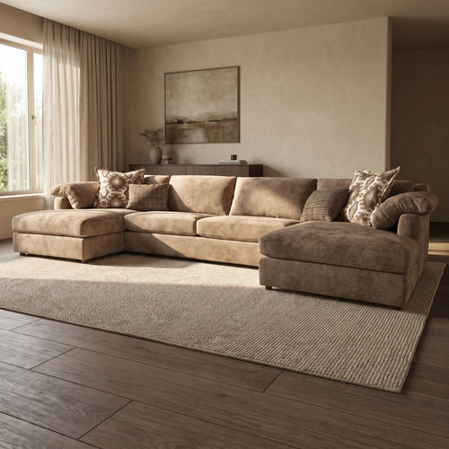 Ashbourne Super Grande Double Chaise Sofa — main lifestyle view in a warm stone and walnut living room
