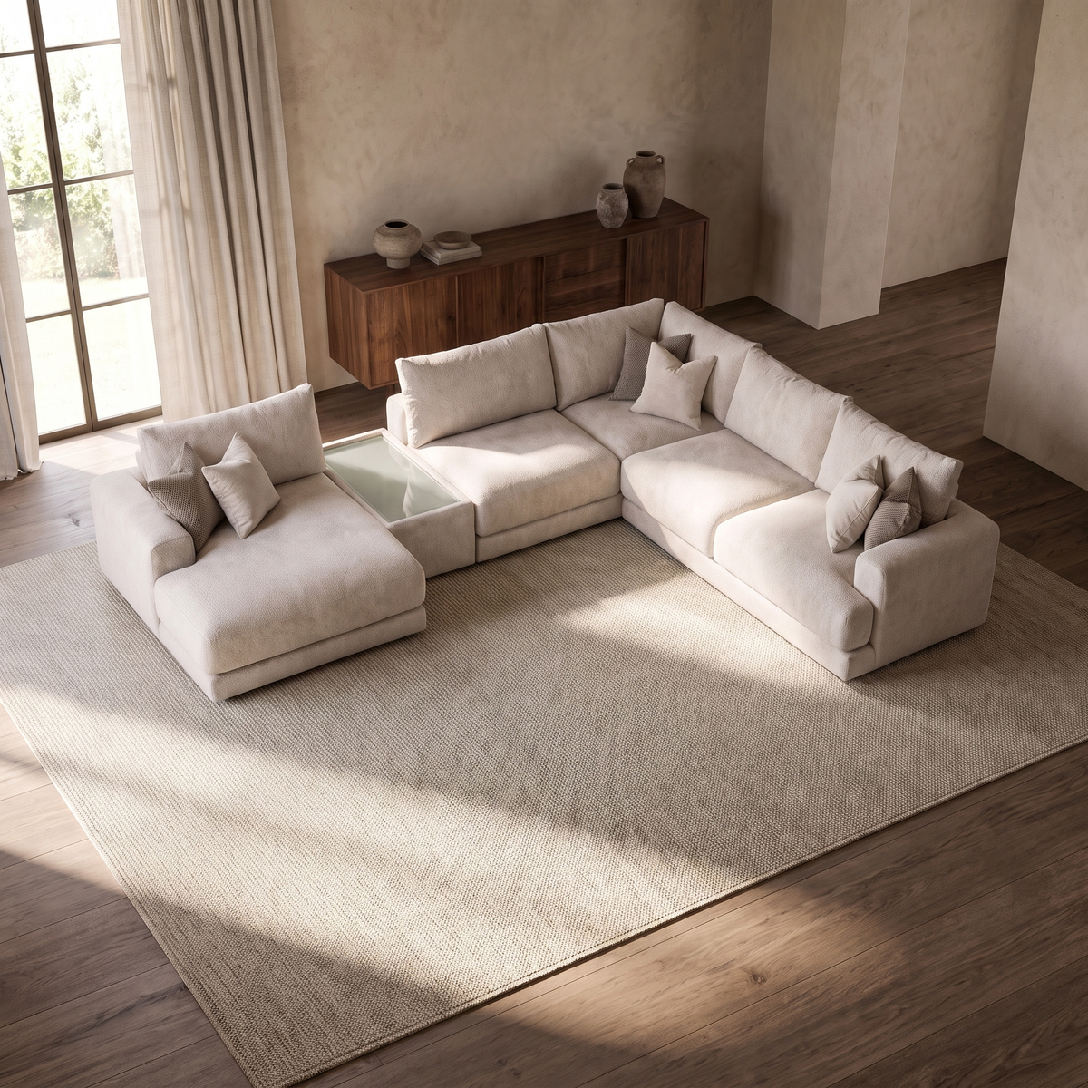 Aurelia Large Chaise Sofa & Glass-Top Table Set — elevated camera view in a warm stone and walnut living room