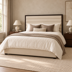 Wayland cream upholstered bed with dark framed horizontal panel headboard in a warm bedroom. Room visualisation; mattress and styling separate.