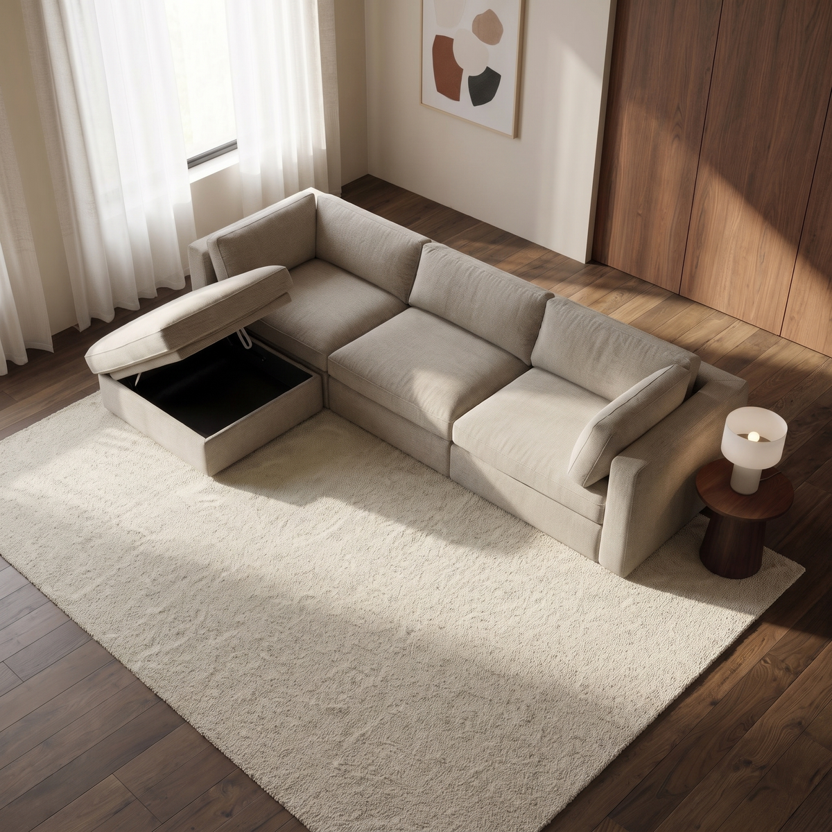 Bellano 3 Seater Sofa + Storage Ottoman — elevated camera view in a warm stone and walnut living room