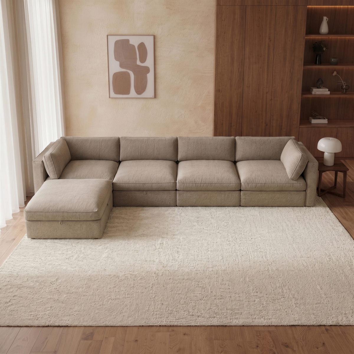 Bellano 4 Seater Sofa + Storage Ottoman — elevated camera view in a warm stone and walnut living room
