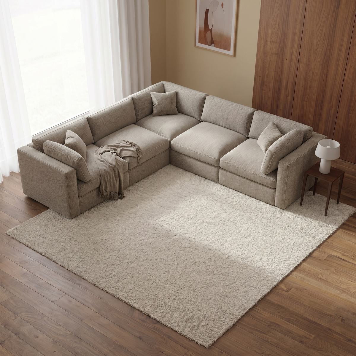 Bellano Corner Sofa — elevated camera view in a warm stone and walnut living room