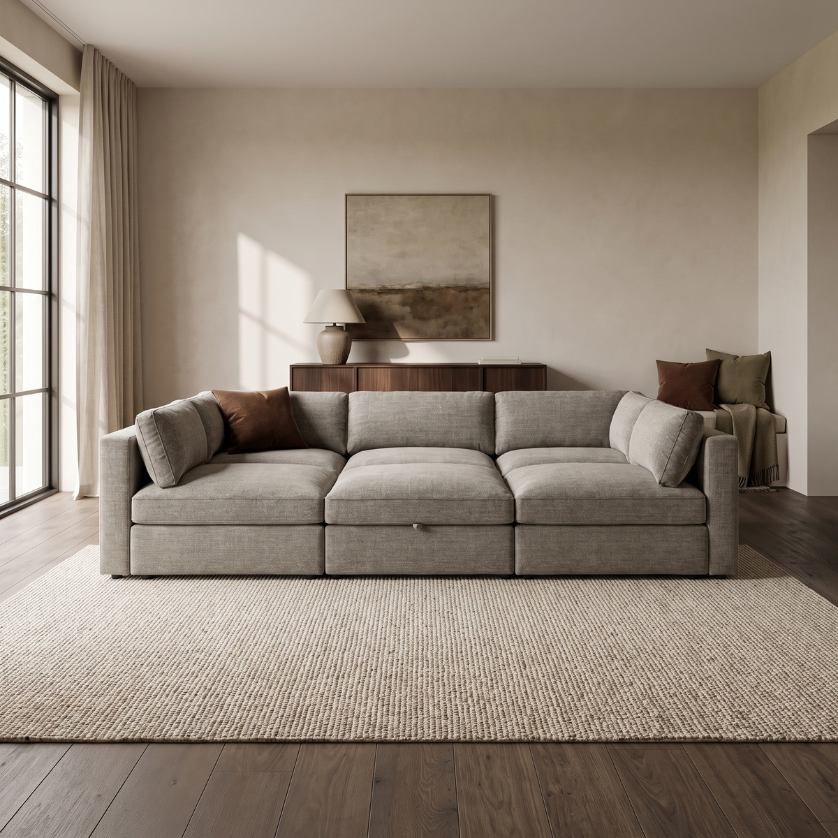 Bellano Pit Cinema Sofa in an aspirational warm stone and walnut living room, natural daylight and realistic fabric texture