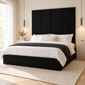 Four Black Teddy 45cm wall panels behind a matching upholstered bed base in a styled bedroom. Room visualisation; panels sold individually, base and styling separate.