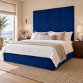 Four Blue Plush Velvet 45cm wall panels behind a matching upholstered bed base in a styled bedroom. Room visualisation; panels sold individually, base and styling separate.