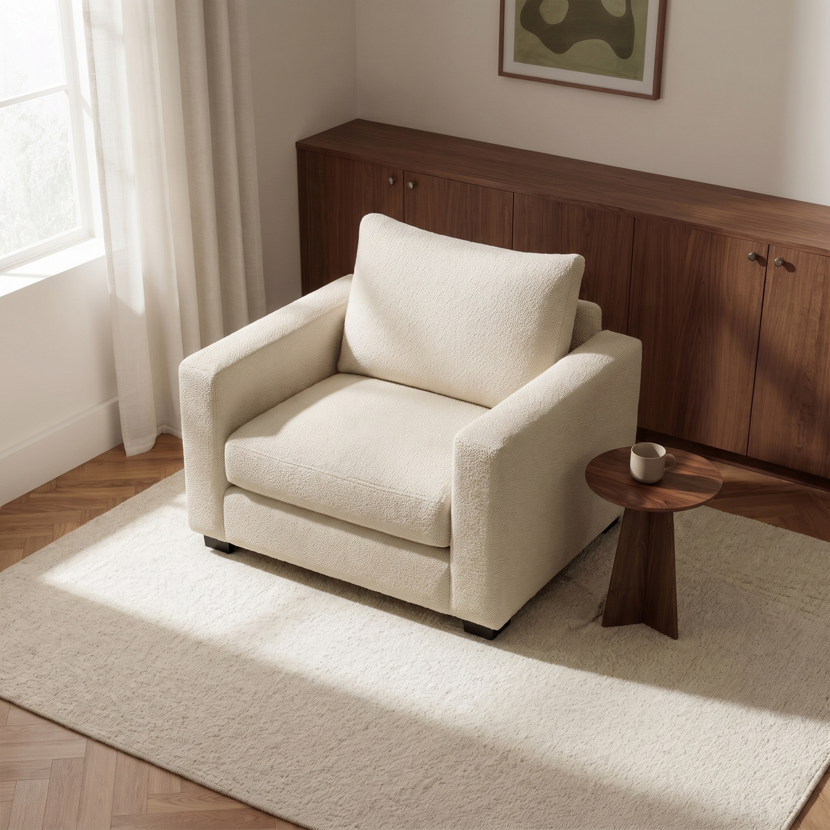 Haven Armchair — elevated camera view in a warm stone and walnut living room