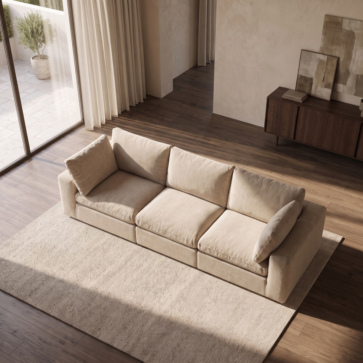 Linara 3 Piece Feather Modular Sofa — elevated camera view in a warm stone and walnut living room
