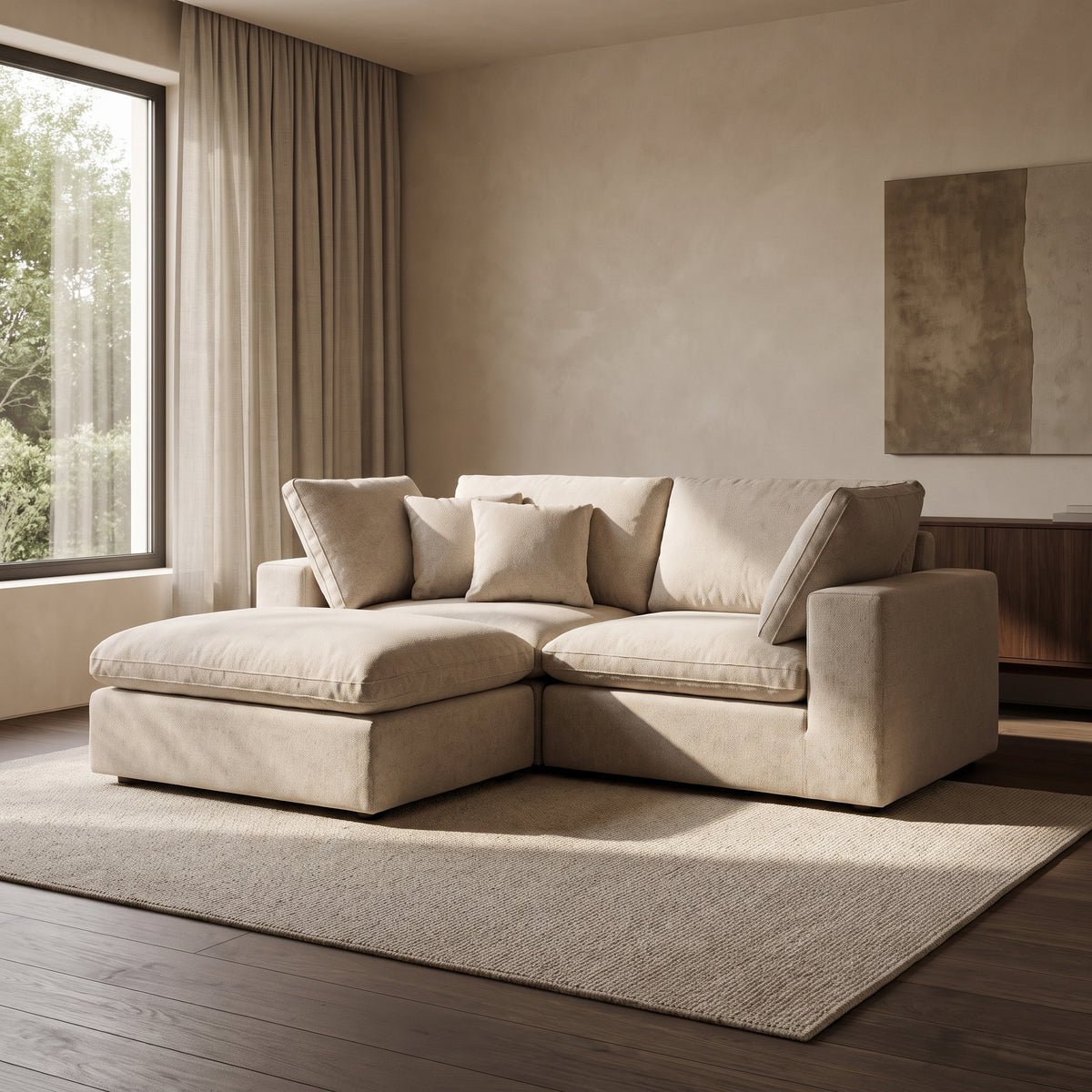 Linara Feather Modular Chaise Sofa — main lifestyle view in a warm stone and walnut living room