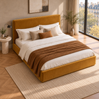 CK Living Linwood upholstered bed in warm ochre velvet — elevated lifestyle view