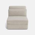Modern modular corner sofa seat in light beige fabric, front view, minimalistic design