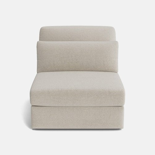 Modern modular corner sofa seat in light beige fabric, front view, minimalistic design
