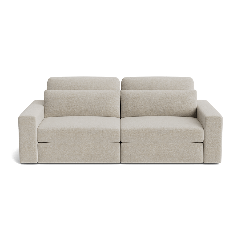 Modern beige modular sofa with wide arms and plush cushions, ideal for living rooms.
