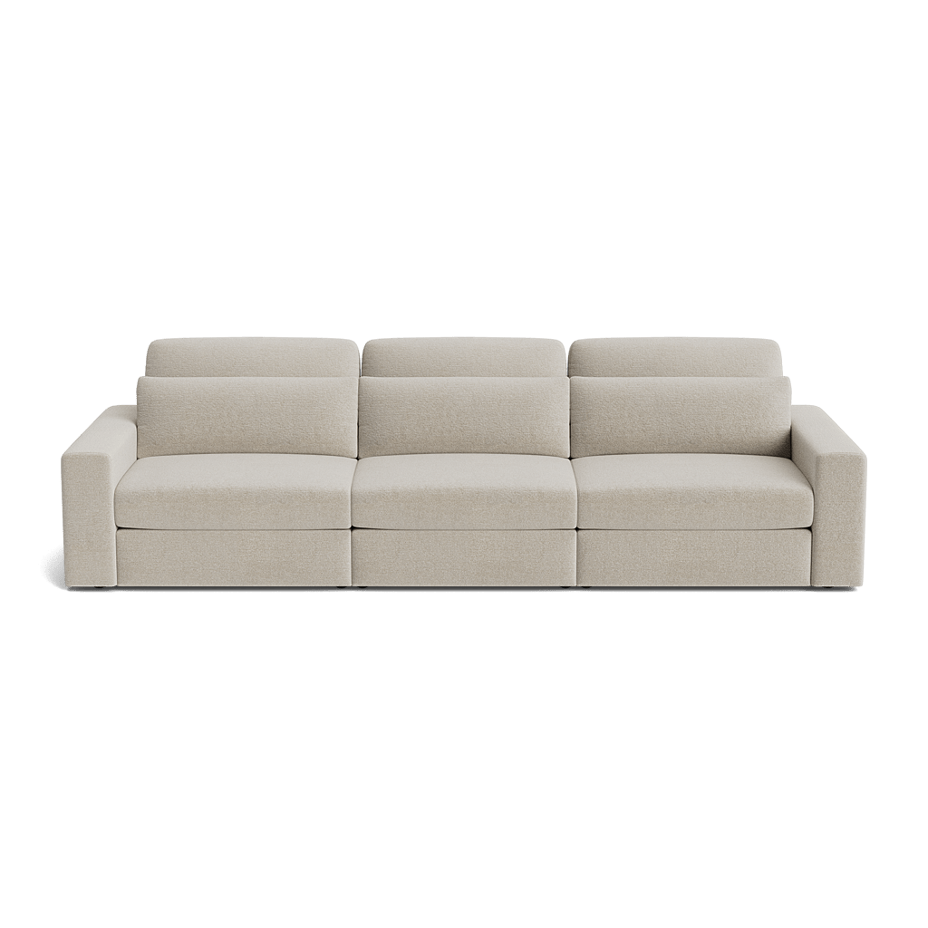 Modern cream modular 4-seater sofa with wide armrests and plush back cushions