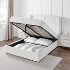 Modern double boucle ottoman storage bed in white with gas lift open, showing bedding inside