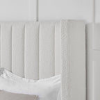Textured white boucle ottoman storage bed headboard with vertical panel design