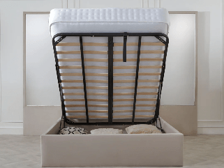 Cream double ottoman bed with mirrored headboard and open storage compartment