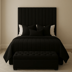Upholstered double bed with vertical panelled headboard, black bedding, and matching bench