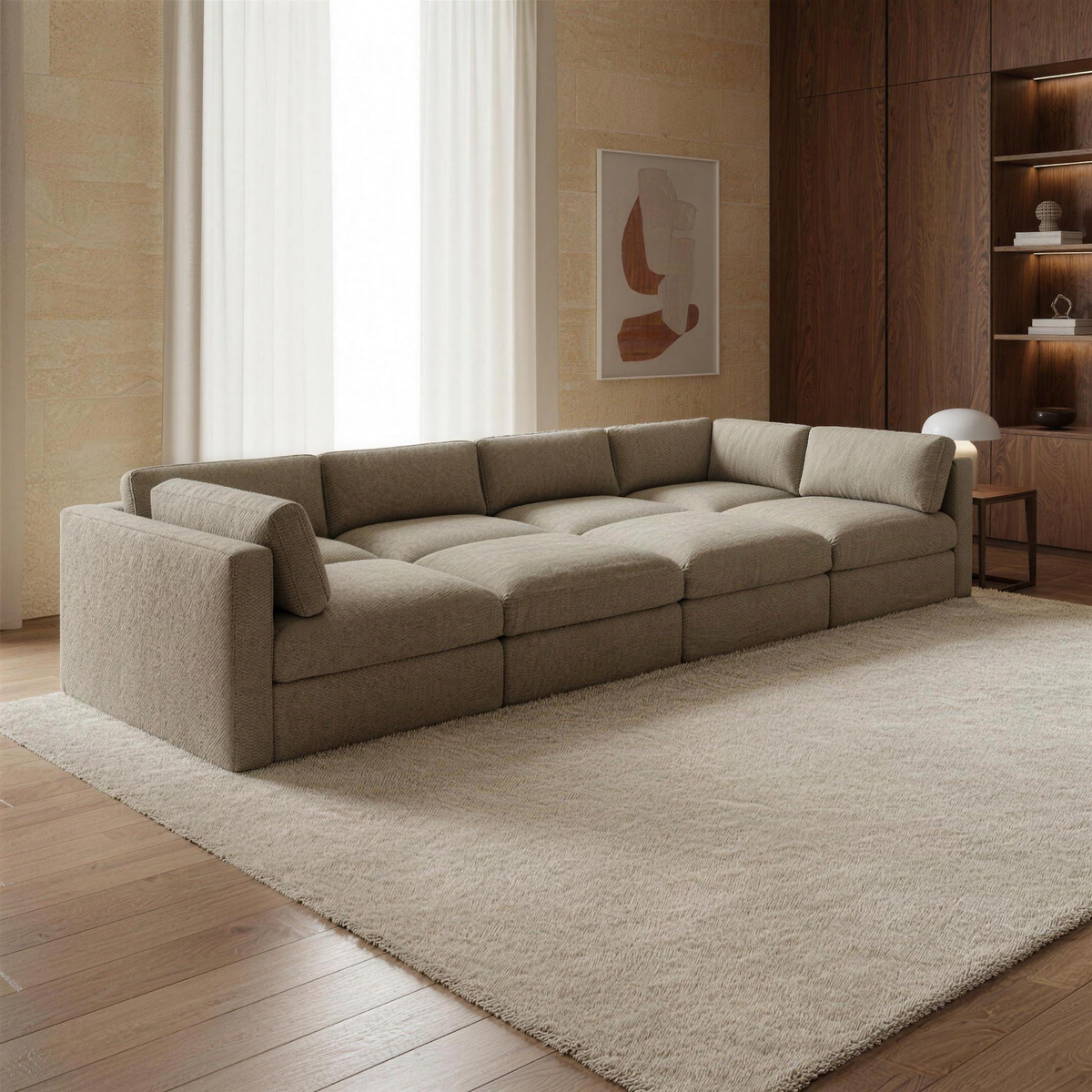 Bellano Grand Pit Sofa + Storage Ottoman in taupe chenille in a warm walnut and limestone living room