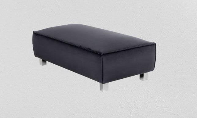 Modern black fabric footstool with metal legs against a light textured background
