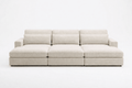Modern cream fabric cinema sofa with wide armrests and plush cushions, three-seater design