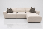Cream left-hand facing corner sofa with chaise, geometric black and white cushions