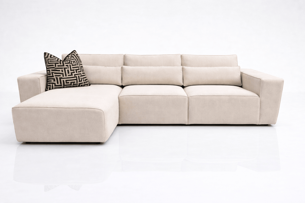 Cream corner sofa with left-hand chaise and black patterned cushion, modern living room furniture
