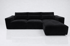 Modern black corner sofa with right-hand facing chaise and wide armrests on white background