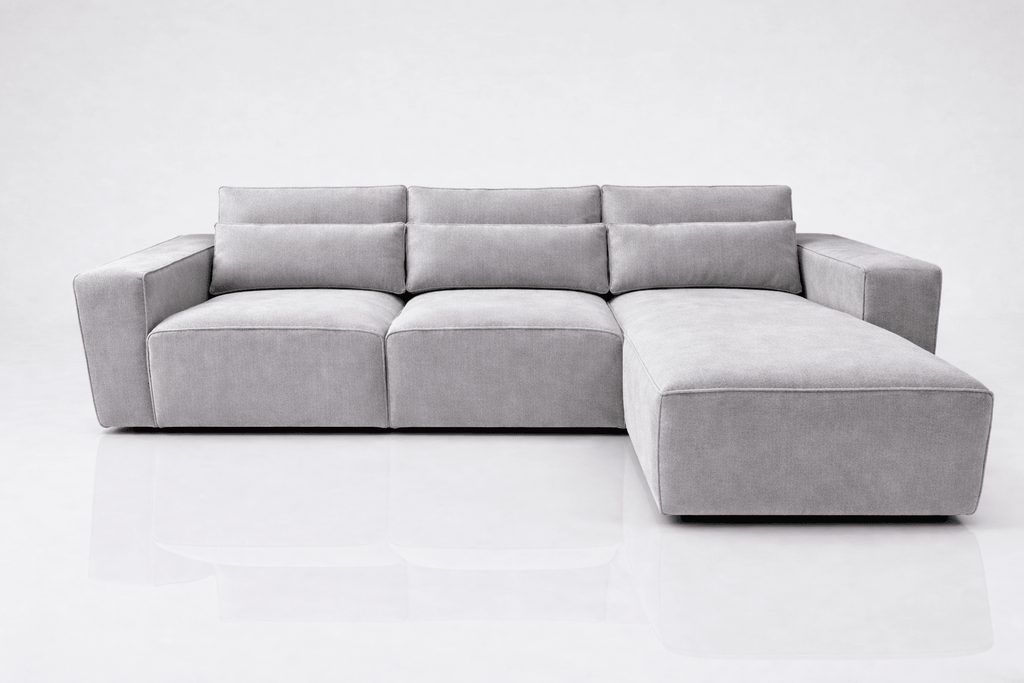 Cream left-hand facing corner sofa with chaise, modern 3 seater design on white background