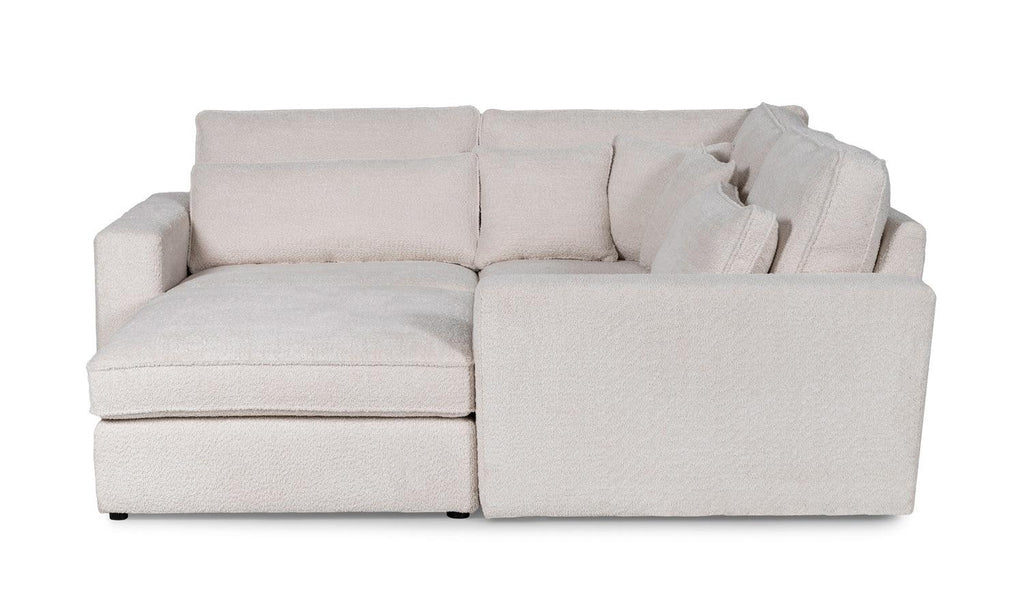 Modern cream boucle corner sofa with plush cushions and left chaise lounge