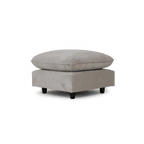 Cream fabric ottoman with plush cushion and dark wooden legs, modern living room footstool