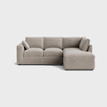 Modern cream right corner sofa with chaise lounge and plush cushions on white background