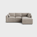 Modern cream right corner sofa with chaise lounge and plush cushions on white background