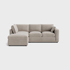 Modern cream right corner sectional sofa with chaise and cushions on white background