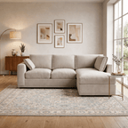 Cream right corner sofa in a modern living room with abstract wall art and large window
