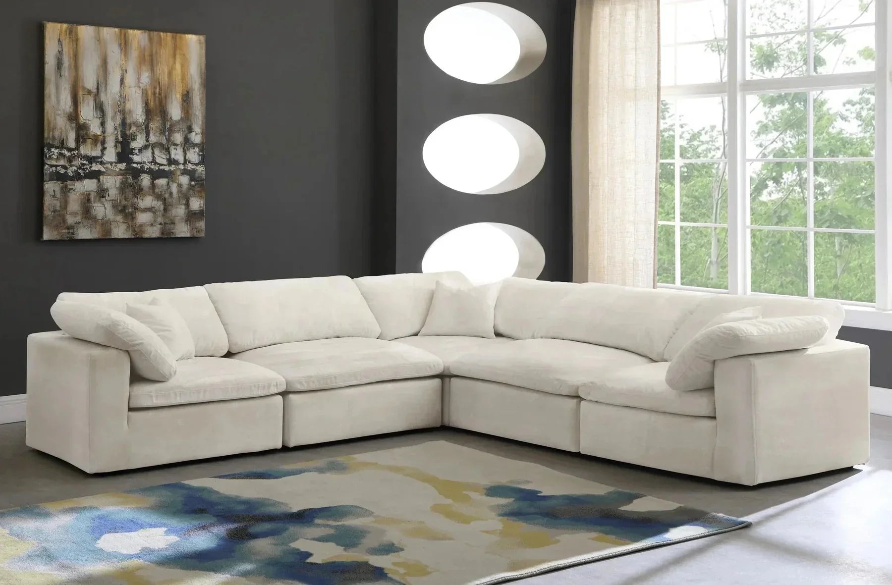 Cream modular corner sofa with feather-filled cushions in modern living room setting