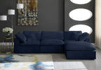Modern navy blue corner sectional sofa with chaise in stylish living room setting