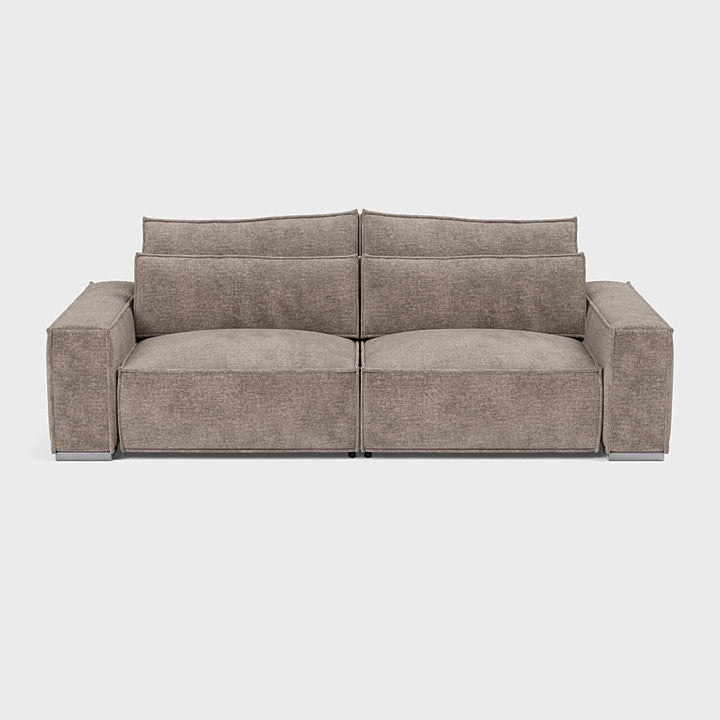 Modern taupe double corner sofa with wide arms and plush cushions on white background
