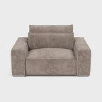 Taupe fabric corner sofa armchair with wide arms and modern block design on light background