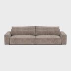Modern taupe corner sofa with double footstool and plush cushions on light background