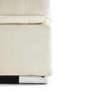 Cream upholstered footstool with chrome legs on a white background