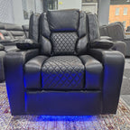 Black leather electric recliner armchair with diamond stitching and blue LED base lighting