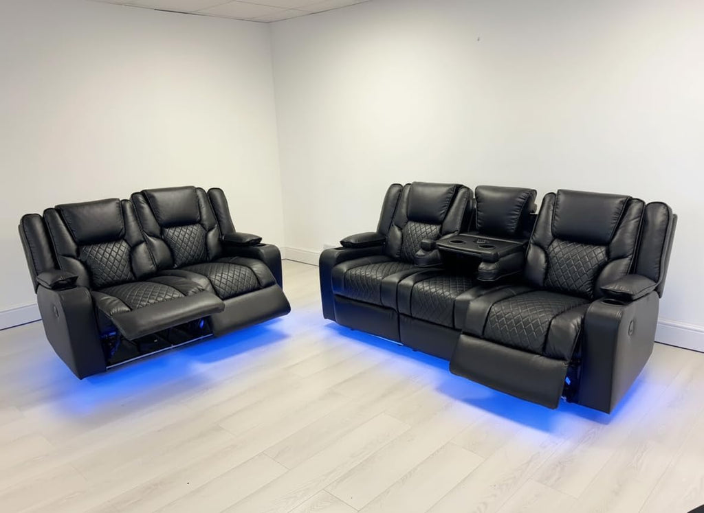 Black leather electric recliner sofa set with blue LED lighting on a light wood floor