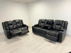 Black leather electric recliner sofa set with cup holders in modern living room.