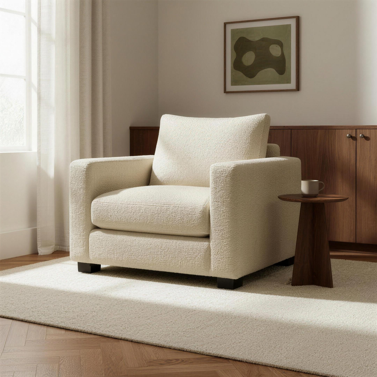 Haven Armchair in cream bouclé in a warm walnut and ivory living room — full sofa lifestyle view