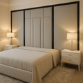 Double bed with piped velvet winged headboard, modern nightstands, and neutral bedding
