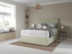 Firm support double-sided mattress on upholstered bed in a modern, neutral bedroom
