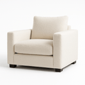Modern cream boucle armchair with plush cushions and dark wood legs, isolated on white