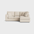 Modern cream right corner sofa with chaise and cushions on light background